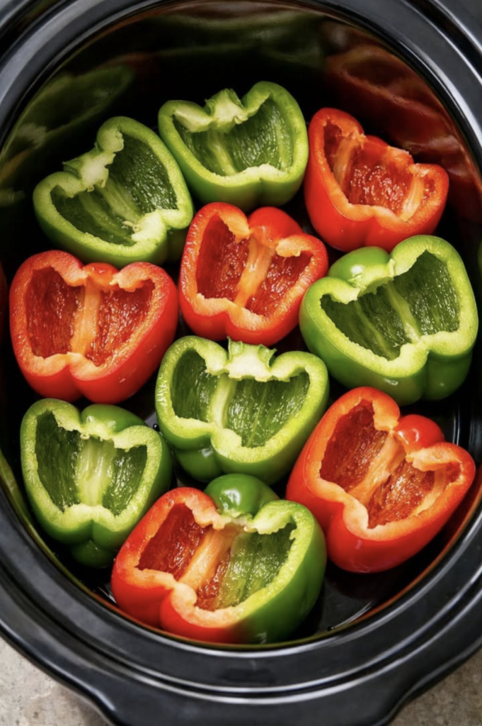 Put raw halved bell peppers in the slow cooker and 4 other ingredients to get a meal so delicious your family will be begging for more.
